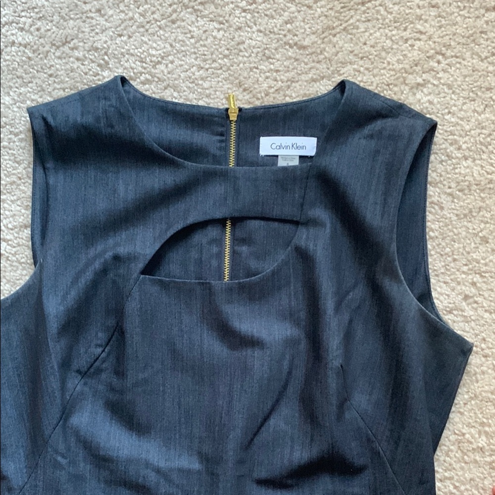 Calvin Klien Chic denim like Sleeveless Dress  with unique cut out design.